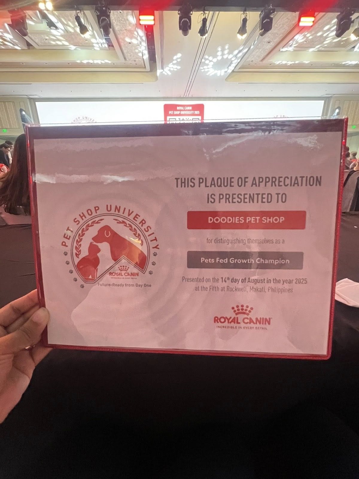 Doodies Pet Shop receiving Royal Canin Excellence Award 2025