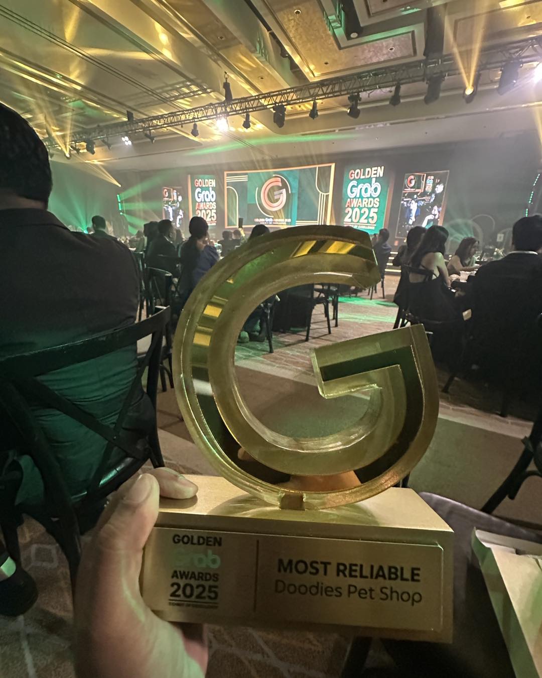 Doodies Pet Shop receiving GrabMart Golden Grab Award 2025